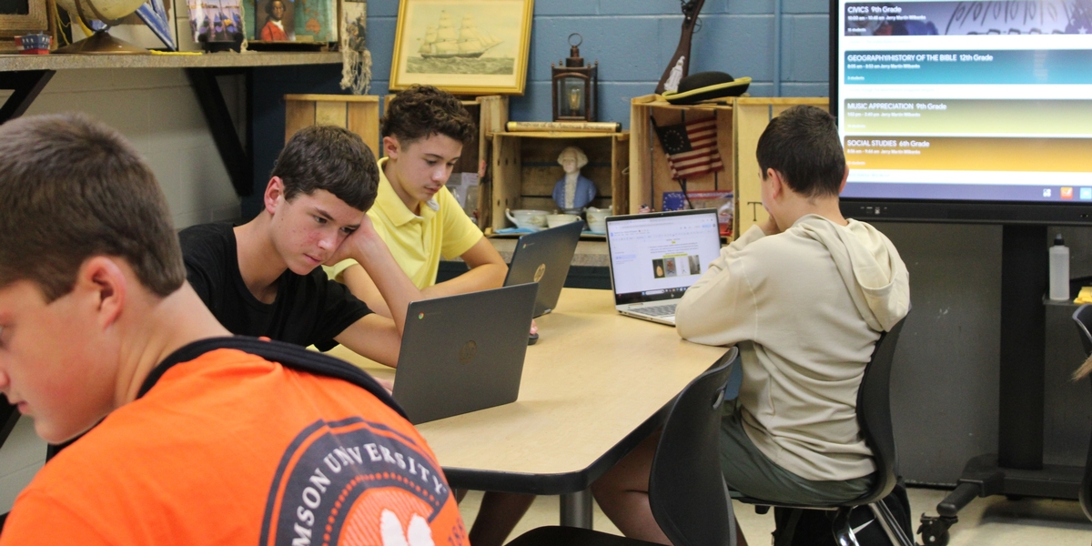 Students working on Laptops